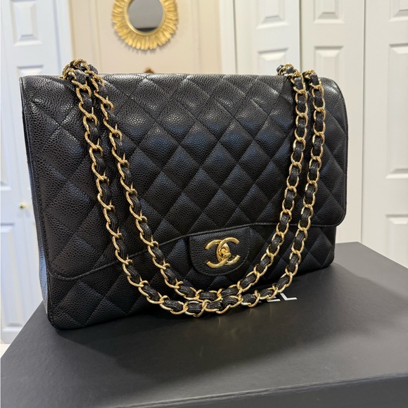 CHANEL Handbags - Chanel black caviar maxi flap - full set like new 2019
